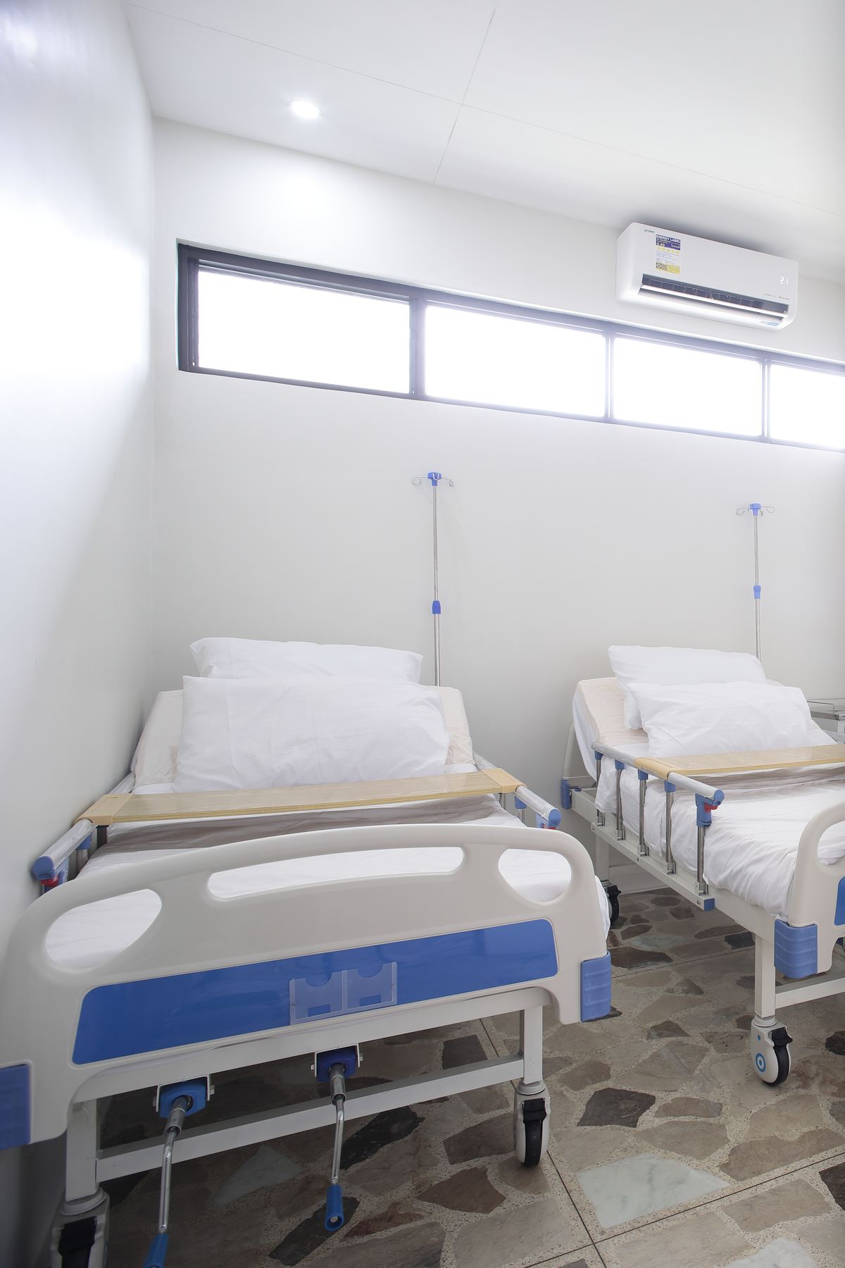 Bright resident room with personal storage lockers